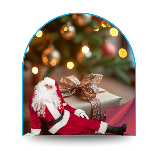 père Noel devant un cadeau